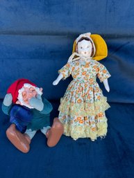 Gnome (4') & Porcelain Doll (7')