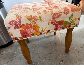 Floral Upholstered Footstool With Wooden Legs And Nailhead Detailing