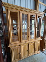 Wooden Hutch With Glass-Front Cabinets And Storage