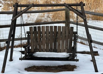 Rustic Wooden Swing With Metal Frame And Chains