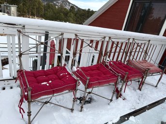 Four  Metal Chairs With Red Cushions