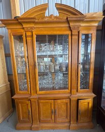 Oak China Cabinet With Arched Pediment And Glass Panel Doors