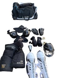Youth Hockey Gear Including Bauer Bag And Protective Equipment