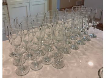 Collection of Crystal Champagne Flutes with Cut Faceted Stems