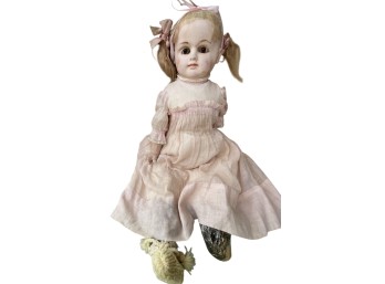 Bisque Doll With Blonde Hair, Pink Dress, And Knit Stockings, Circa 1920 Per Note