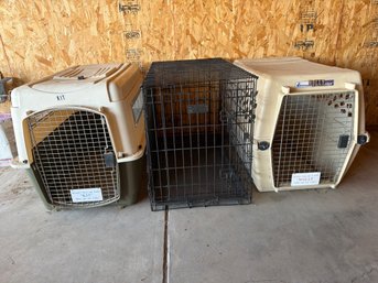 Three Pet Carriers Including Plastic And Metal Designs