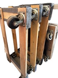 Four Wooden Furniture Dollies With Carpeted Ends