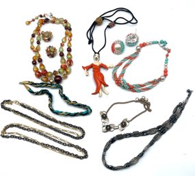 Collection Of Jewelry Including Necklaces, Bracelets And Earrings