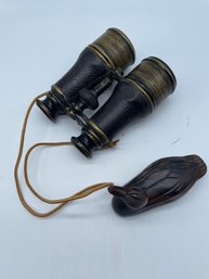 Binoculars And Wooden Duck