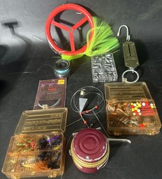 Fishing Tackle Collection, Including Lures, Hooks, Sinkers, A Fishing Line Spool, And A Tackle Box