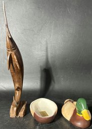 Two AVON Wooden Carvings: A Marlin And A Duck
