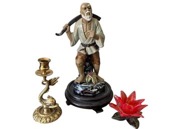 Collection Of Decorative Objects: Resin Figurine, Brass Candlestick, Glass Lotus