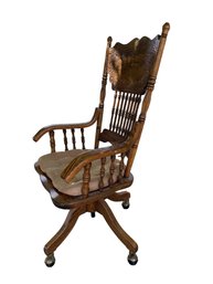 Pressed-Back Oak Swivel Desk Chair With Arms