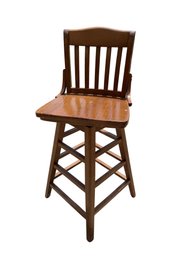 Wooden Swivel Bar Stool With Slat Back And Medium Oak Finish