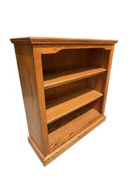 Oak Three-Shelf Open Bookcase With Crown Molding