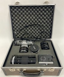 Canon Camera Kit With Case, Includes A Film Camera, Multiple Lenses, A Flash Unit, And More