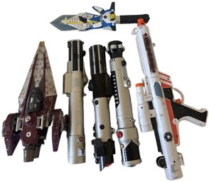 Collection Of Star Wars And Sci-Fi Toy, Lightsabers, Blaster, Starfighter, And Space Sword