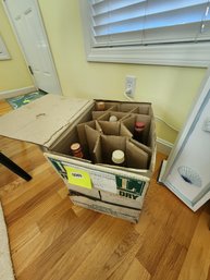 069 - BOX OF EMPTY BOTTLES