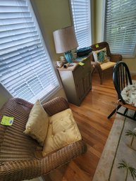 061 - PAIR OF WICKER ARM CHAIRS WITH LIGHT CUSHIONS