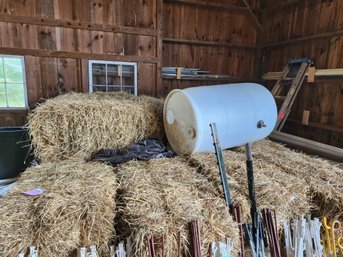 122 - STACK OF STRAW BALES - CUT IN JUNE OF 2025 - BARREL NOT INCLUDED