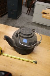 7    CAST IRON TEA KETTLE
