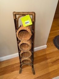 041 - VINTAGE WICKER WINE RACK WITH FOUR HOLDERS