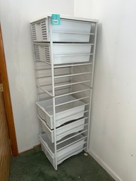 141 - Storage Tower With Pull-out Drawers