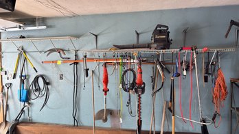 122 - Large Wall Assortment Of Garden And Hand Tools