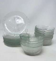 Eight Glass Plates And Ten Glass Bowls