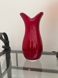 Vintage Ruby Red Cased Glass Vase Featuring A Distinctive Pinched, Flared Rim