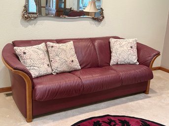 Ekornes Burgundy Leather Stressless Sofa With Distinctive Curved Wooden Armrests