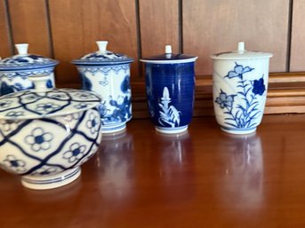 Porcelain Teacups With Lids And Various Designs And Teapot
