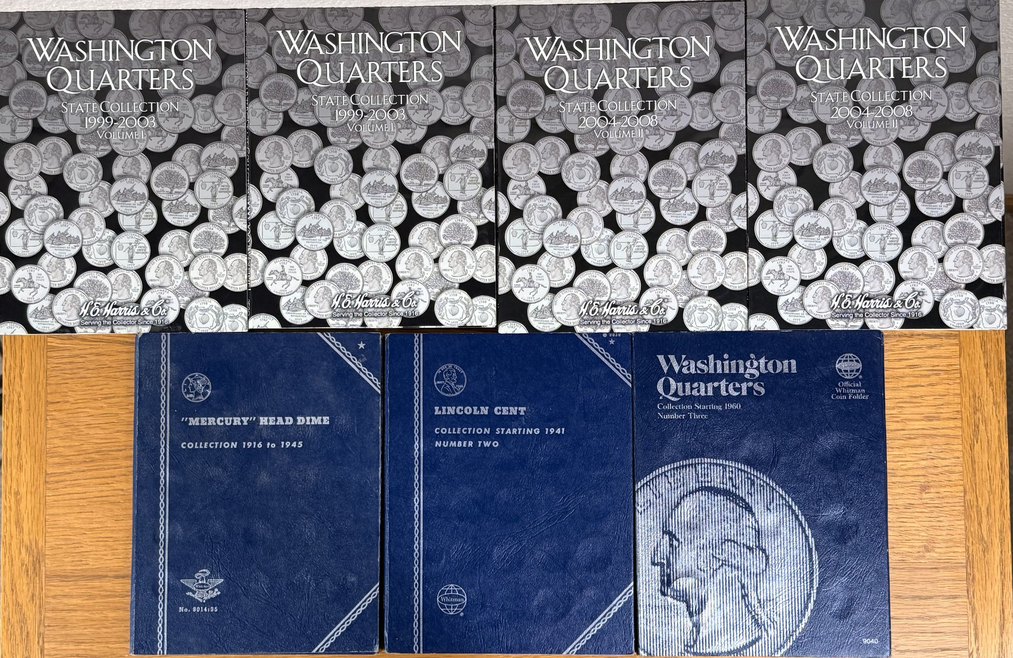 Assortment Of Coin Collection Books #21592 | Auctionninja.com