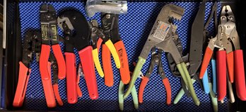 Collection Of Snips, Strippers, And Pliers
