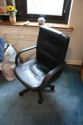Black Faux Leather Executive Office Chair With High Back And Casters