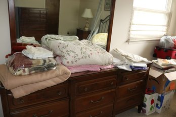 Household Linens Including Floral Quilt, White Sheets, Pink Knit Blanket And Packaged Blanket