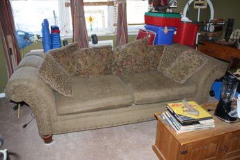 Upholstered Fabric Sofa With Rolled Arms & Floral Accent Pillows
