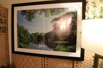 Framed Landscape Photograph Of Green Trees Reflected In A Calm Pond
