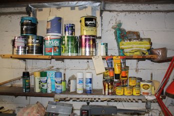 Workshop Paint And Stain Cans With Assorted Coatings And Supplies