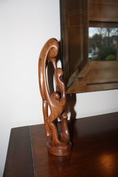 Hand Carved Wooden Spiral Embrace Sculpture Depicting Couple Or Family In Natural Wood Finish