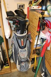 Golf Cart Bag With Assorted Clubs And Headcovers
