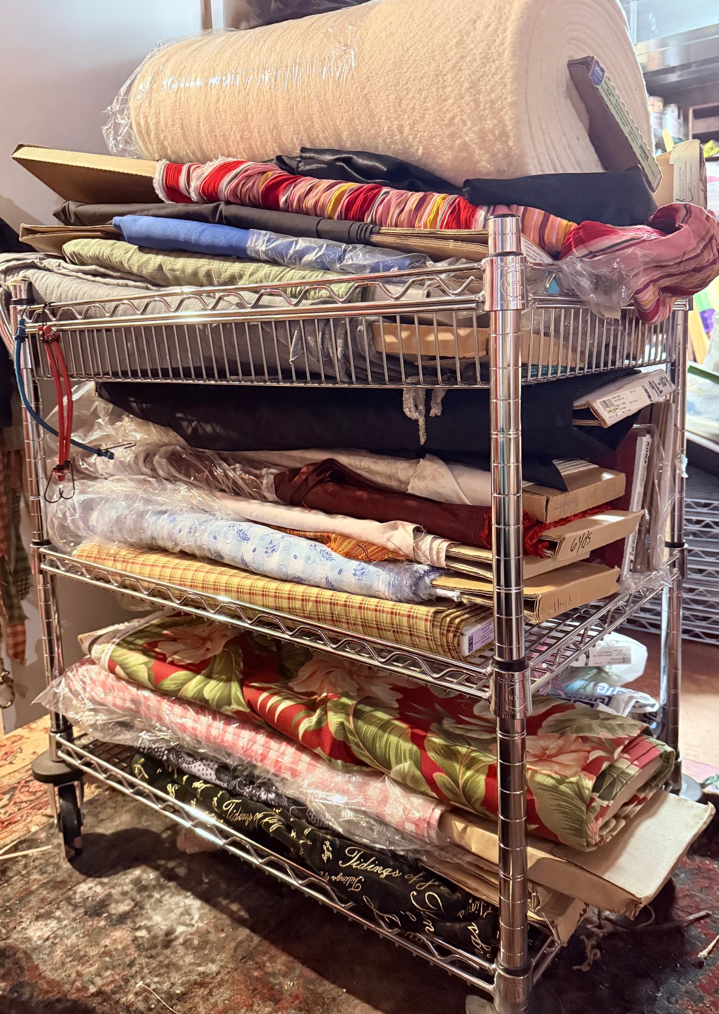 Small Wire Rack With LOTS Of Bolts Of Fabric And Bin Of Fabric Pieces ...