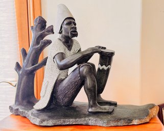 Vintage Hand-carved African Ebony Wood Sculpture Of A Man Playing A Drum Believed To Be By T Medziso