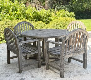 Round Wooden Outdoor Dining Set With Four Matching Armchairs