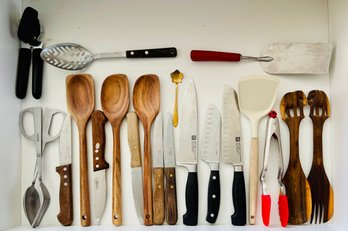 Kitchen Drawer Contains Collection Of Cooking Tools, Including Zwilling Brand Knives