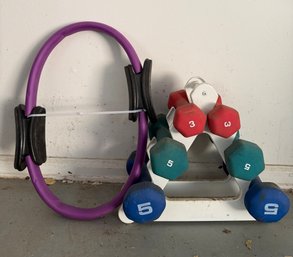 Exercise Equipment - Light Hand Weights On Rack & Pilates Ring