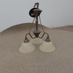 Retro Modern 3 Light Fixture With Matching Glass Shades.