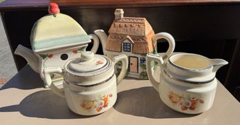 Lot Of Four Pieces- Two Teapots, Creamer And Sugar