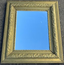 Wall Mirror With Ornate Gold Colored Frame