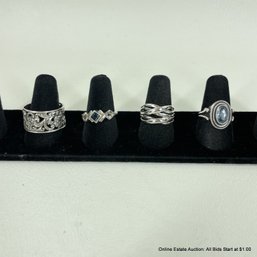 4 Silver Rings Including 2 Sterling Silver (9 Grams Total Weight) And 1 Marked 835